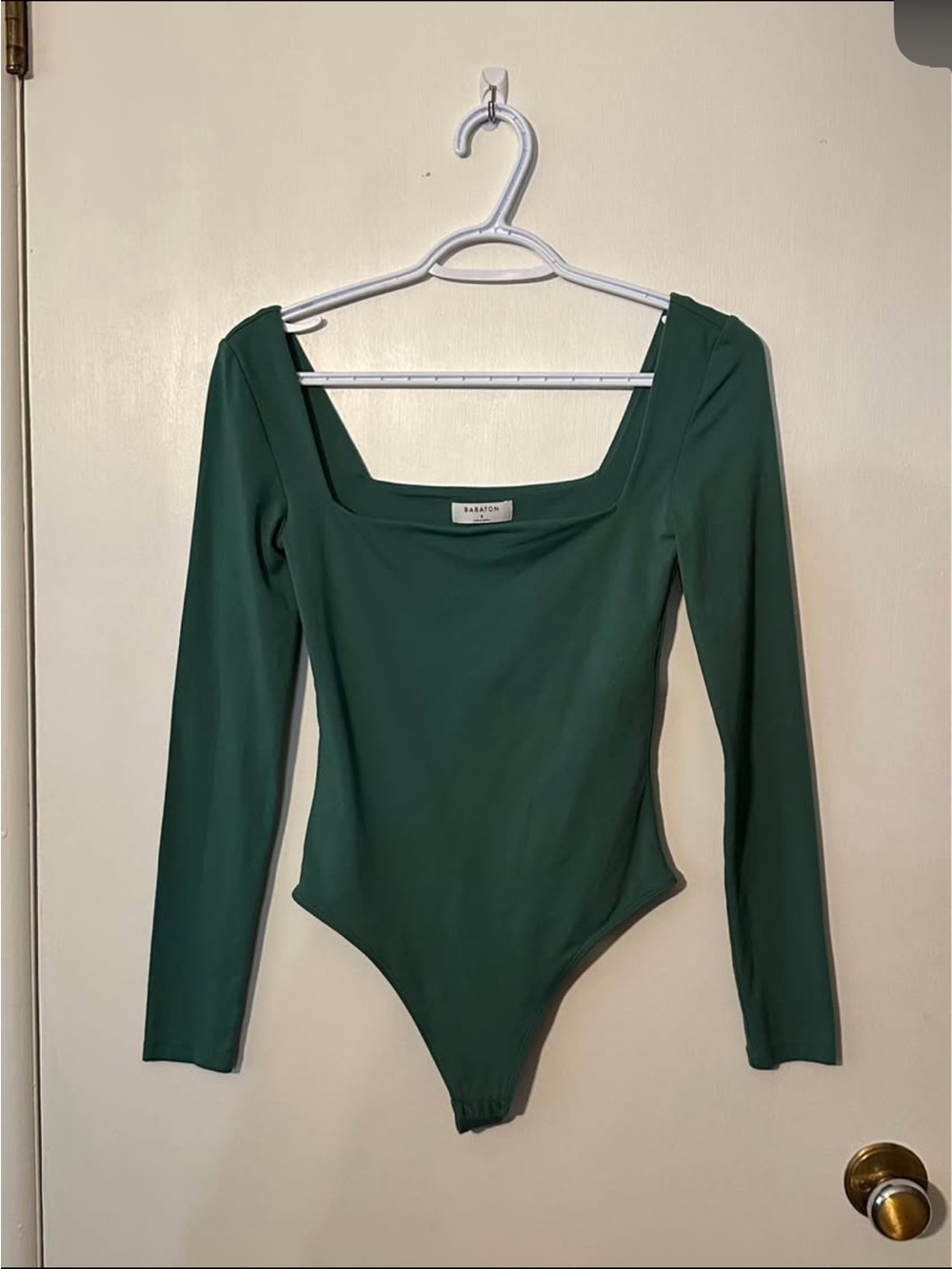 Babaton size small green long sleeve body suit